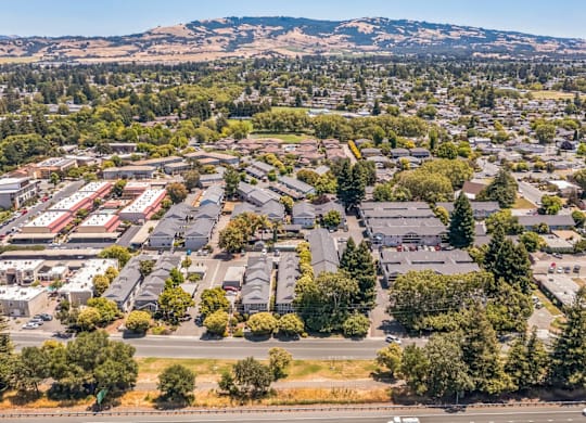 A suburban area with a mix of houses and trees.
