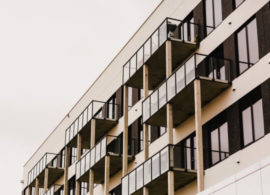 a row of balconies on the side of a building