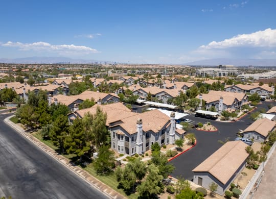 A residential area with houses and a road.