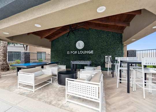A patio with a pool table and chairs is labeled "Lounge".