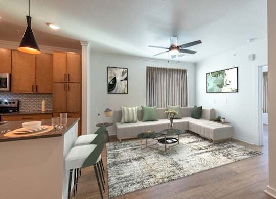 A modern living room with a white couch and a coffee table.