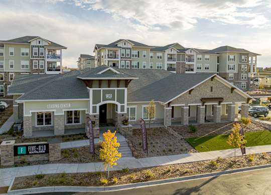 A leasing center for apartment buildings is located in the front of the image.