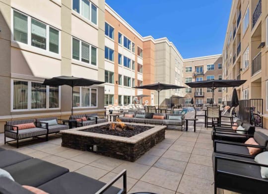 our apartments have a large patio with a fire pit