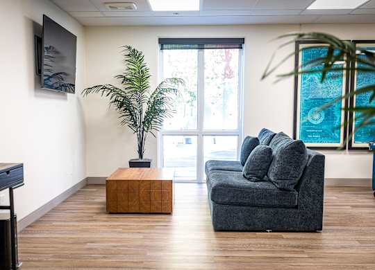 a living room with a couch and a coffee table