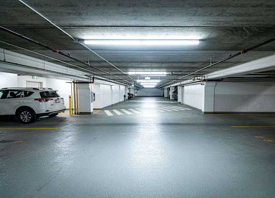 a parking garage with a car in it