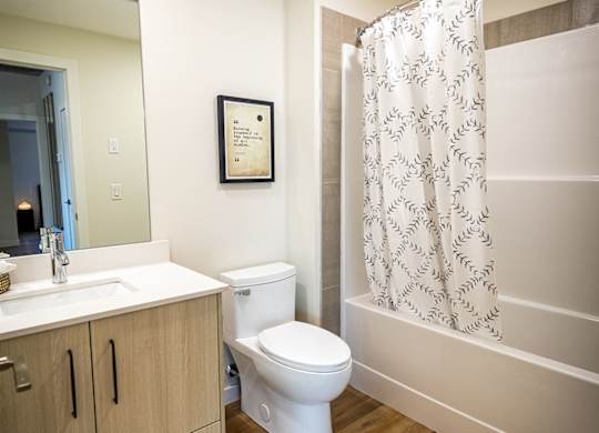 a bathroom with a toilet and a sink