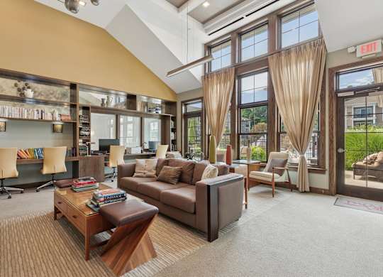 Clubhouse Living Room with Brown Couch at Palmer View, Palmer Township, PA, 18045