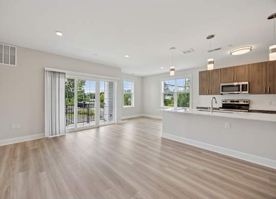 Kitchen with Cabinetry and Room with glass sliding doors at Heritage Court, Ewing