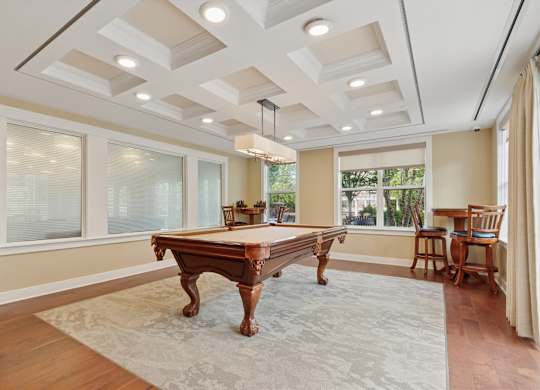 Room with high ceiling and windows with pool table at Palmer View, Palmer Township