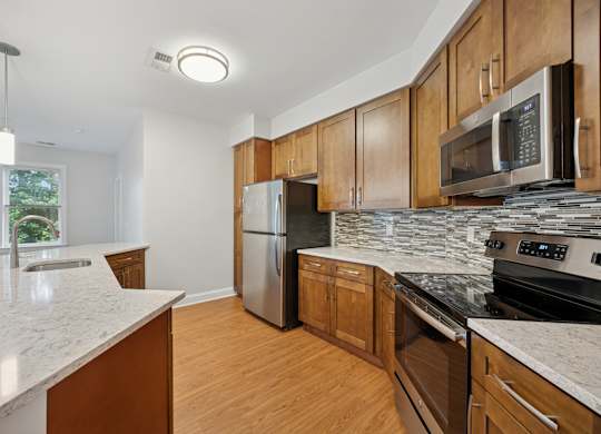 Kitchen with Wooden Cabinets at Heritage Court, Ewing, NJ, 08628