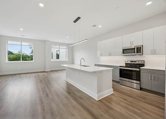Modern Empty Room with Hardwood Floor and White Walls at Heritage Court, Ewing, New Jersey