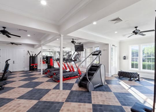 a home gym with a black and white checkered floor  at Harper's Crossing, Langhorne, PA