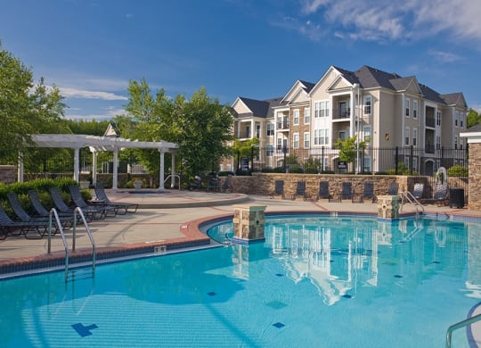 a pool at the west end lodge apartments in beaumont, tx  at Harper's Crossing, Pennsylvania, 19047