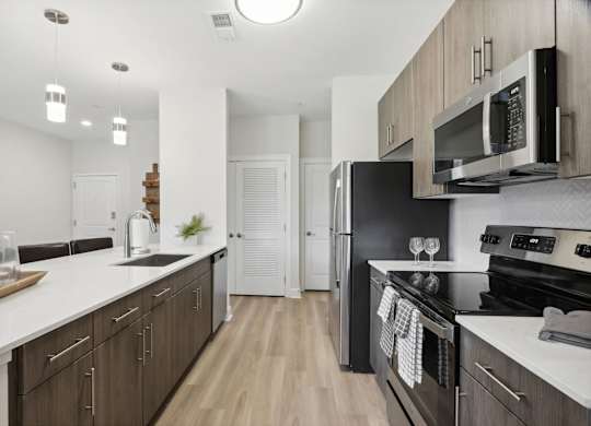 Modern Kitchen with Stove top oven  at Heritage Court, Ewing