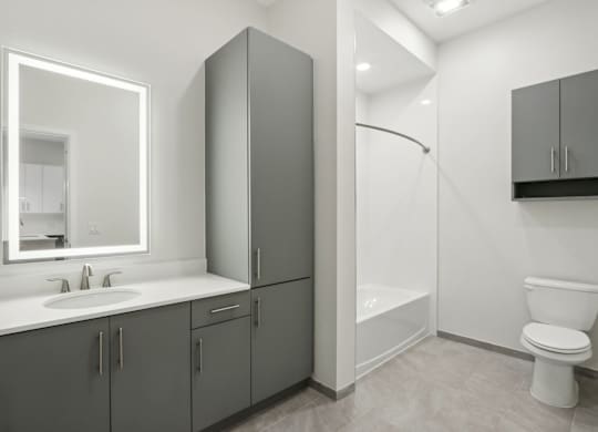 Bright Bathroom with White Tub at Heritage Court, Ewing, 08628