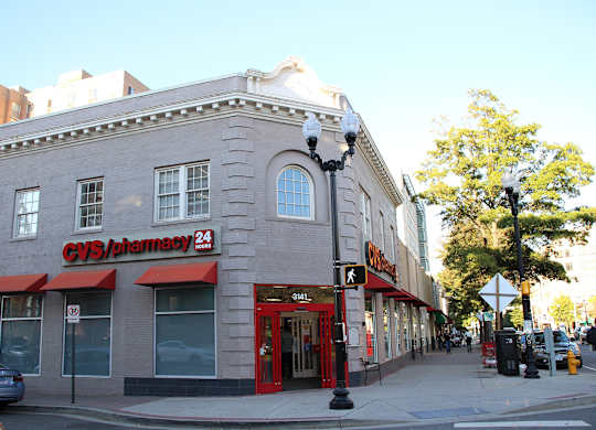 A CVS Pharmacy is located on the corner of a street.