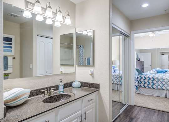 Tresa at Arrowhead Apartments Model Bathroom and Bedroom