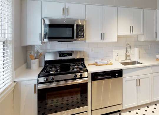 Tiled kitchens with sleek cabinetry at Alister Morristown, Morristown, NJ