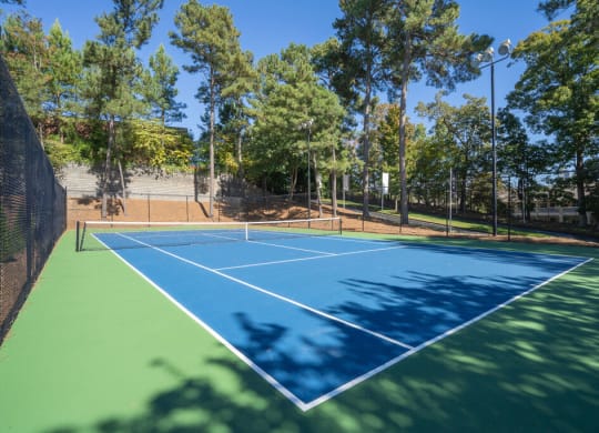 Blue Tennis Court at Elme Cumberland Apartments, Smyrna, Georgia
