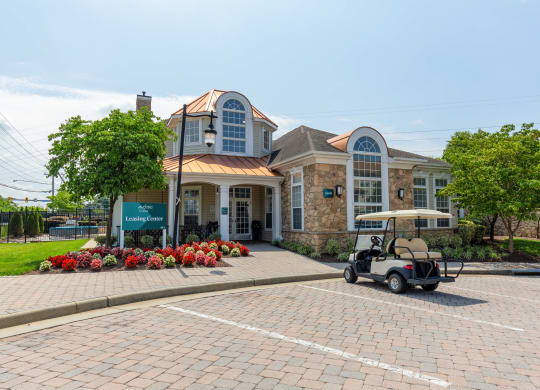 a golf cart parked in front of a building