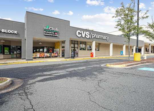 A CVS Pharmacy is located in a strip mall with a Burger King and H&R Block.