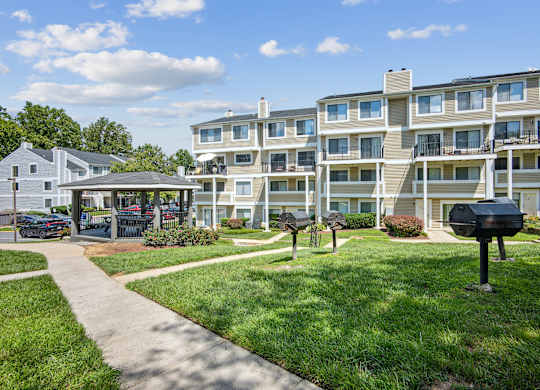 Apartment complex with a walkway in front at Elme Bethesda, Bethesda, 20814