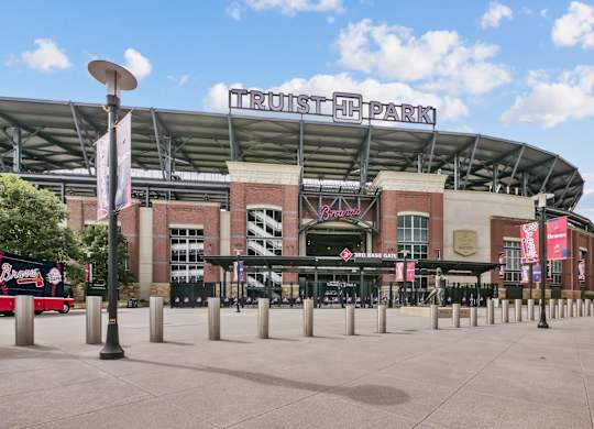 A stadium with a sign that says