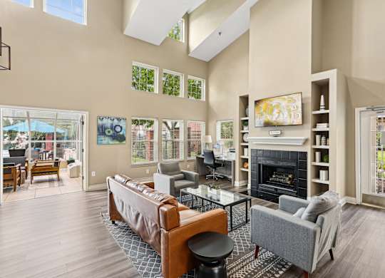 A living room with a fireplace and a couch.