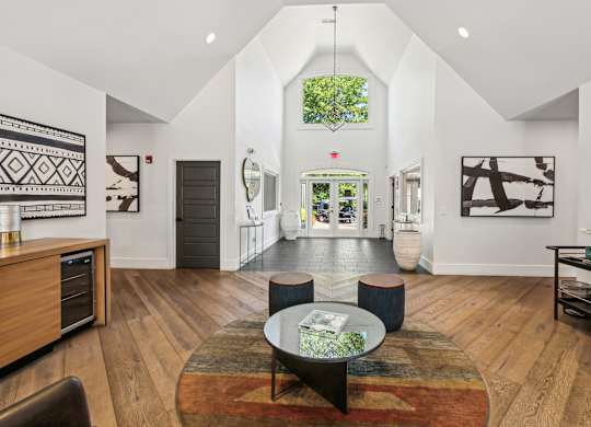 A living room with a rug and a coffee table  at Elme Marietta Apartments, Marietta, GA