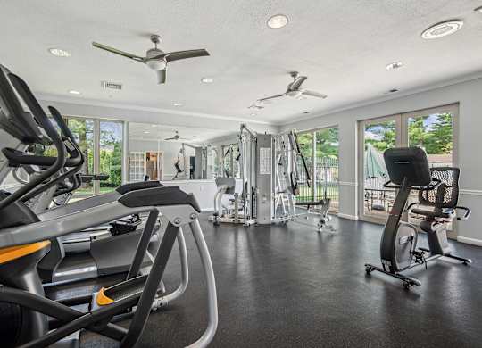 A spacious gym with a variety of exercise equipment at Elme Watkins Mill, Gaithersburg