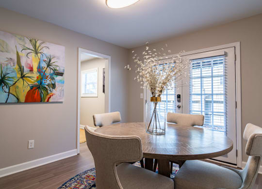 Dining room space with table decor at Elme Sandy Springs Apartments, Atlanta, GA, 30350