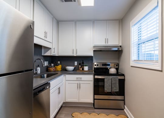 White kitchen at Elme Sandy Springs Apartments, Atlanta, GA, 30350