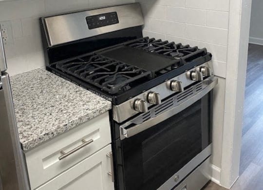 Stove and microwave at Wellington Apartments, Arlington, VA, 22204