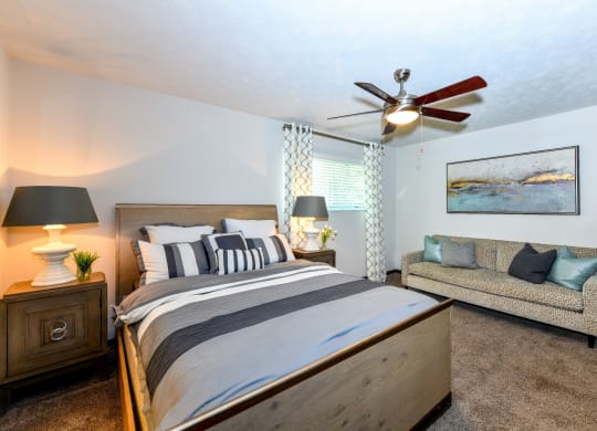 Bedroom with ceiling fan and light at Elme Sandy Springs Apartments, Atlanta, GA, 30350