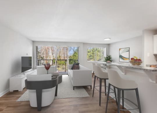 an open living room with a kitchen and a bar and a living room at Roosevelt Towers, Falls Church, VA