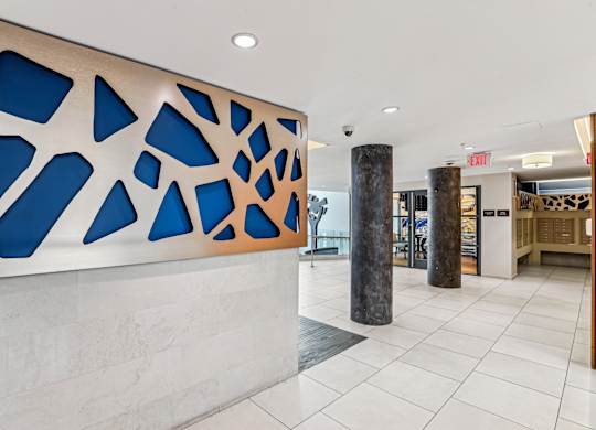 A wall with a blue and brown design on it.