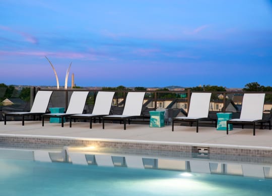 Pool at night at Trove Apartments, Virginia