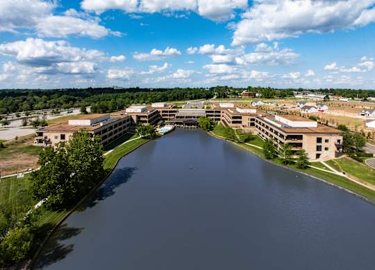 A large body of water is surrounded by buildings.