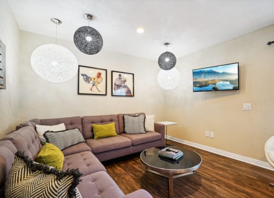 a living room with a couch and a table
