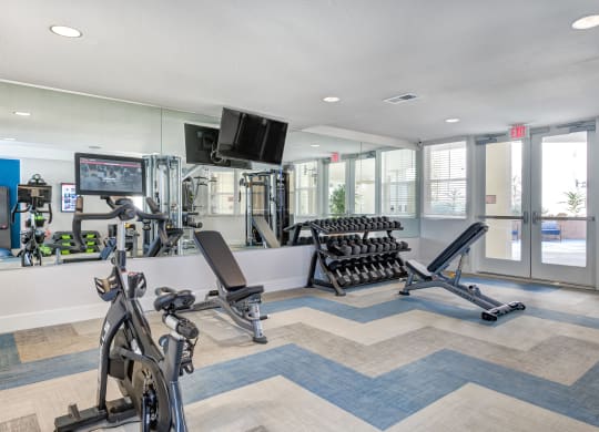 the gym at the bradley braddock road station apartments