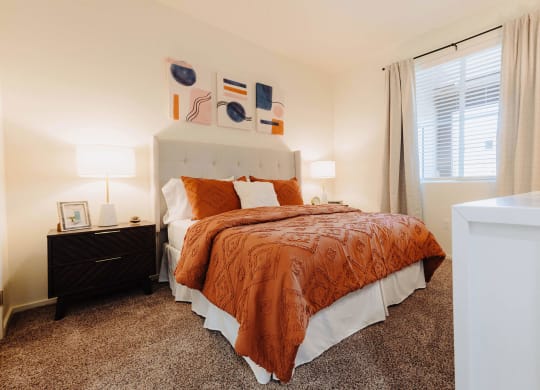 a bedroom with a bed and two nightstands  at Arrive Paso Robles, Paso Robles, CA, 93446