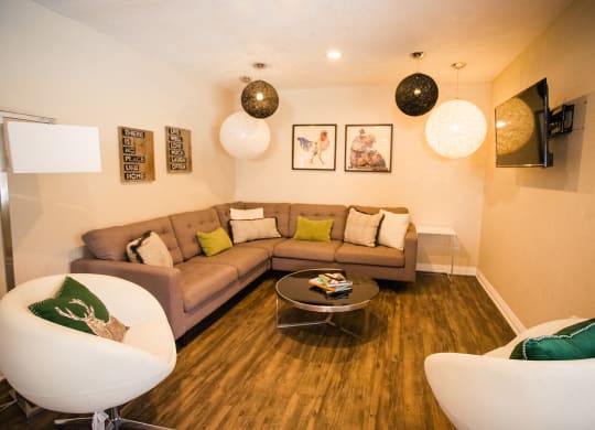 a living room with a couch and a table