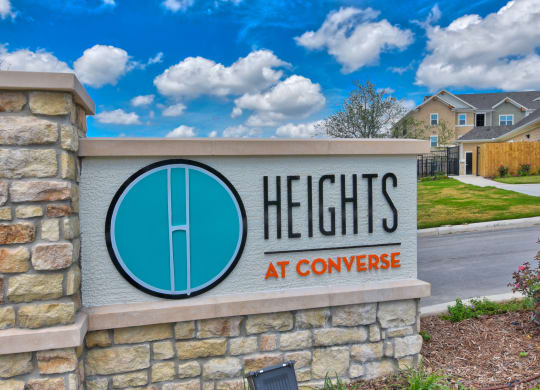 heights at converse apartments entrance sign