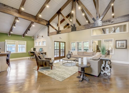 Interior room of Leasing Center with vaulted ceilings and seating area at Wynnwood Vinings Atlanta