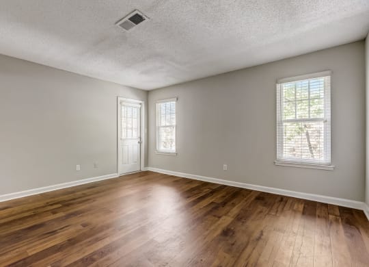 hardwood floors in a spacious living room at Veridian at Sandy Springs