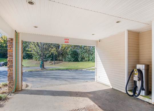A charging station is installed in a garage.