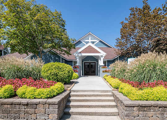 a house with a garden in front of it