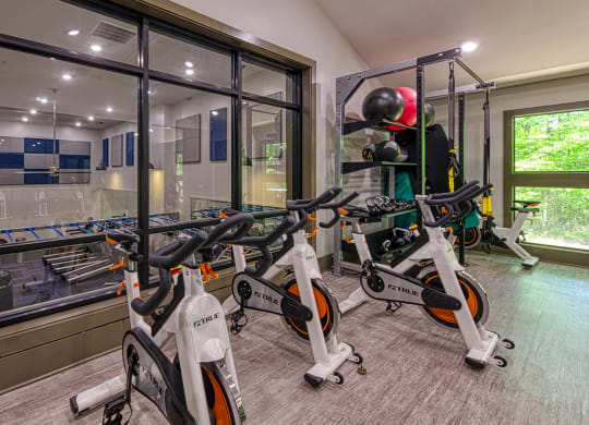 Wynnwood Vinings two story fitness center interior room filled with lots of bikes and exercise equipment