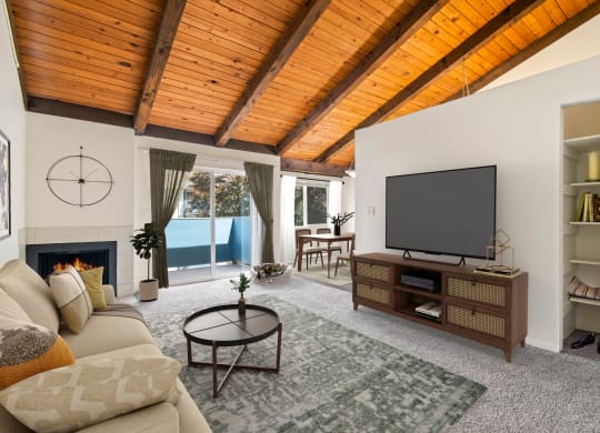 Apartments for Rent in Tukwila, WA - Foster Creek - Furnished Living Room with Carpet Flooring and Sliding Glass Door to Balcony