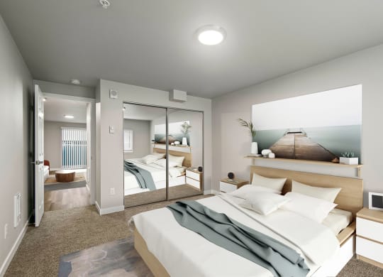 a renovated bedroom with a large bed and a mirror at  Foster Creek apartments in Tukwila